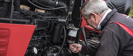 Pathfinder Power employee servicing Perkins filter
